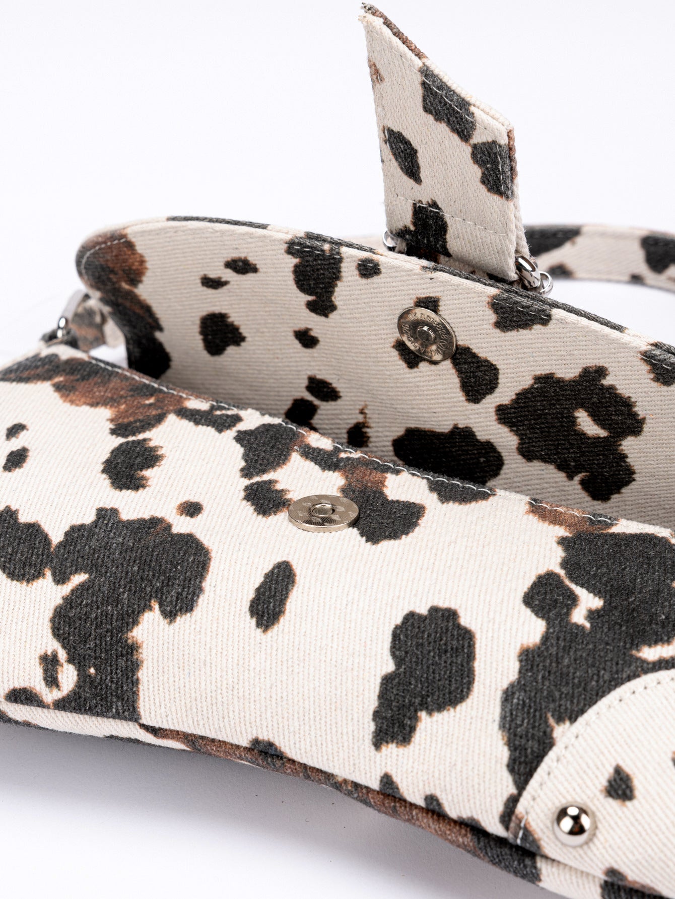 White & Black Cow Print Mini Flap Crossbody Bag with Snake Print Strap & Silver Studs